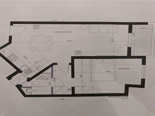 a wall with a bunch of pictures on it