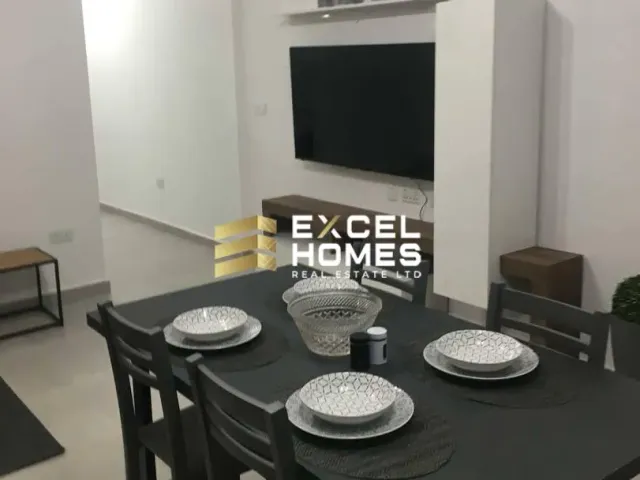 a table with a white tablecloth and a white table cloth