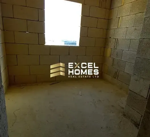 a wall with a brick wall and a window