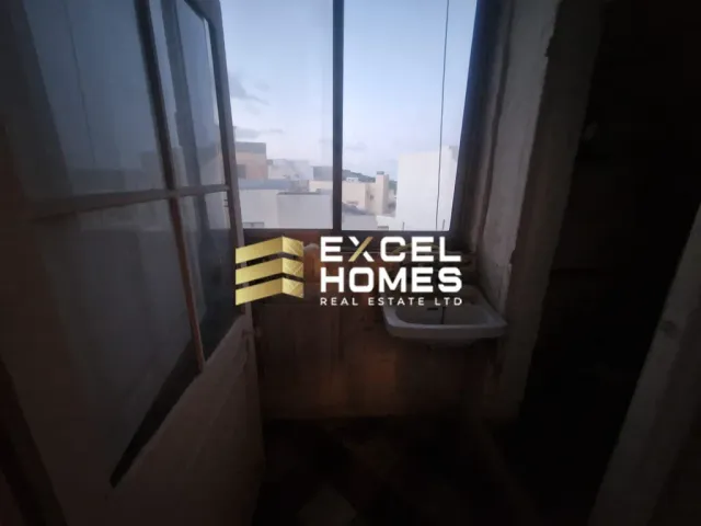 a window with a view of a city