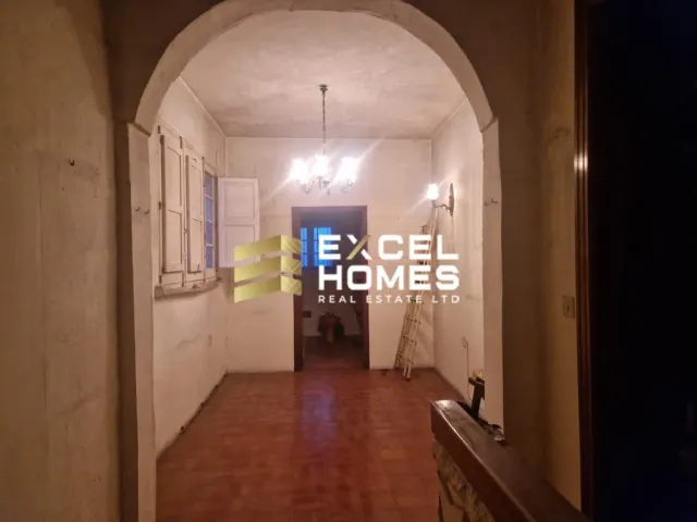 a large room with a large window and a clock