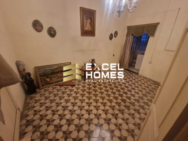 a room with a rug and a rug mat