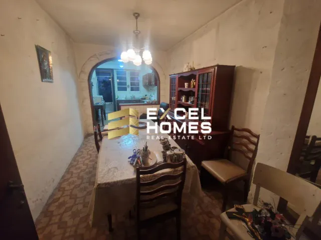 a living room with a couch and a table