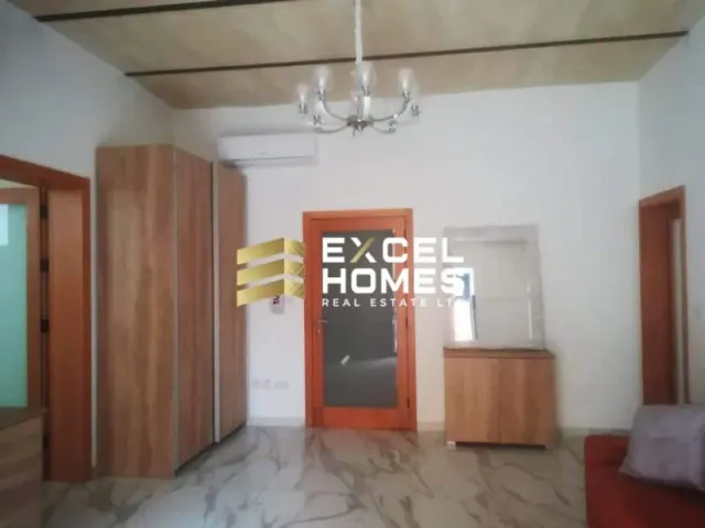 a door to a bathroom with a door open