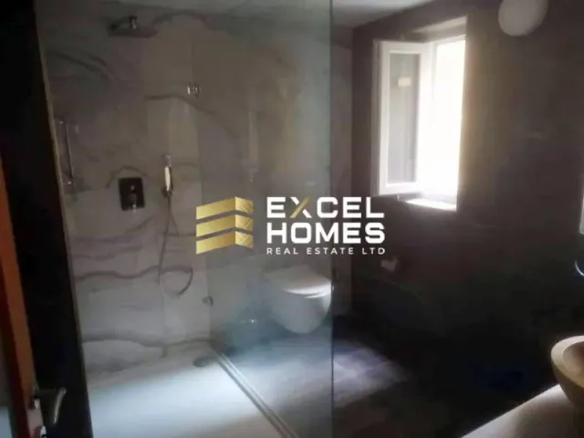 a bathroom with a toilet and a bathtub