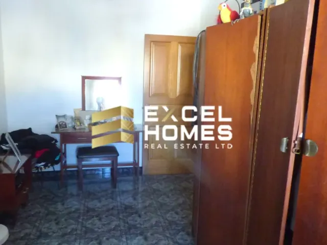 a room with a door and a dog on the floor