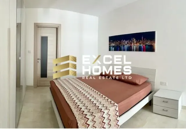 a bed room with a bed and a desk