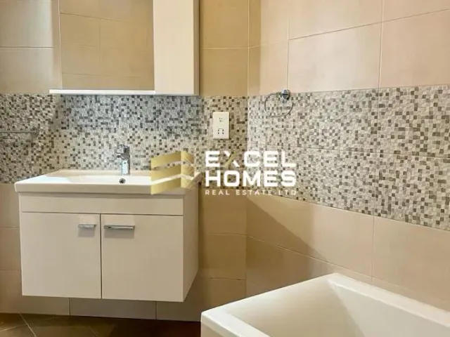 a bathroom with a sink, toilet and bathtub