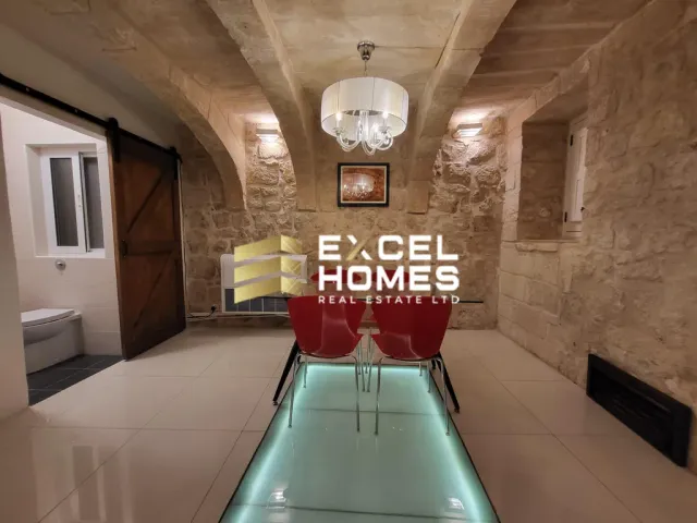 a room with a large clock on the wall