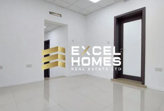 a bathroom with a mirror and a door