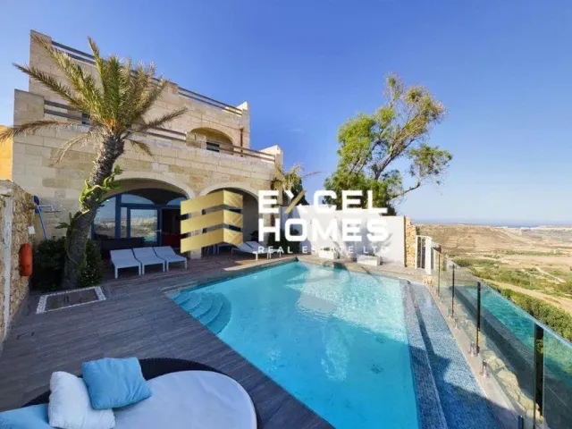 a large white patio with a large window