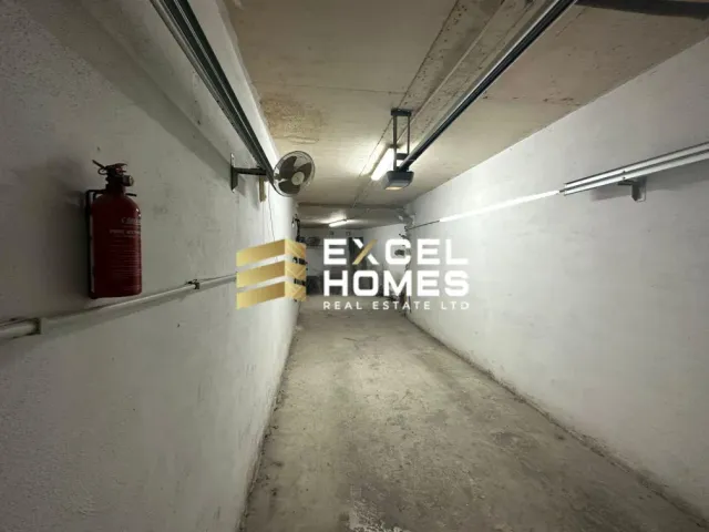 a room with a wall with a wall of graffiti