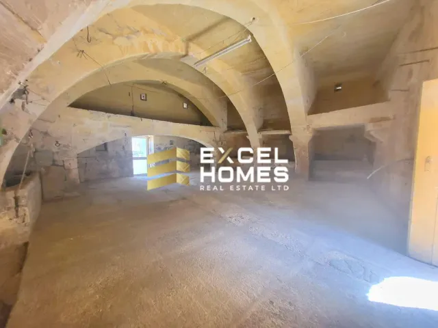 a room with a large window and a large clock 