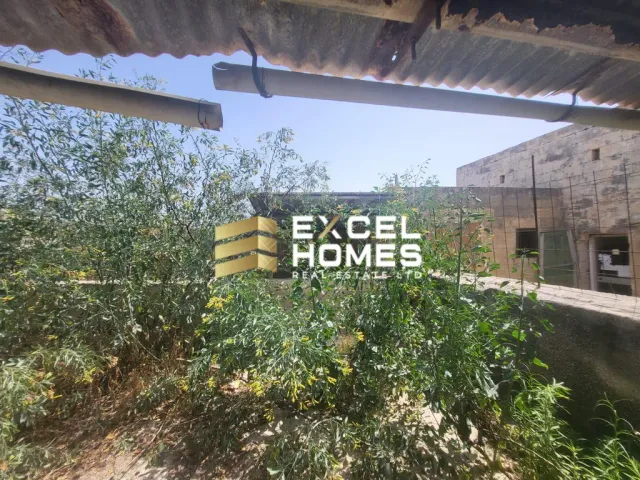 a sign that says "no parking" in front of a building 