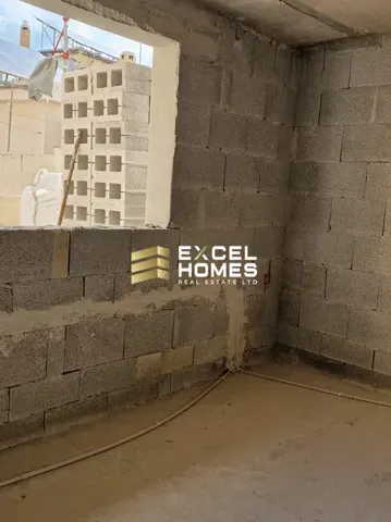 a wall with graffiti on it and a brick wall