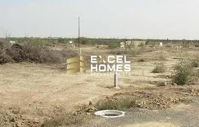 a road with a sign that says "stop" and a sign that says "stop"