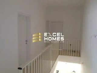 a wall with a picture of a man on it