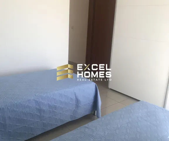 a bed room with a bed and a desk