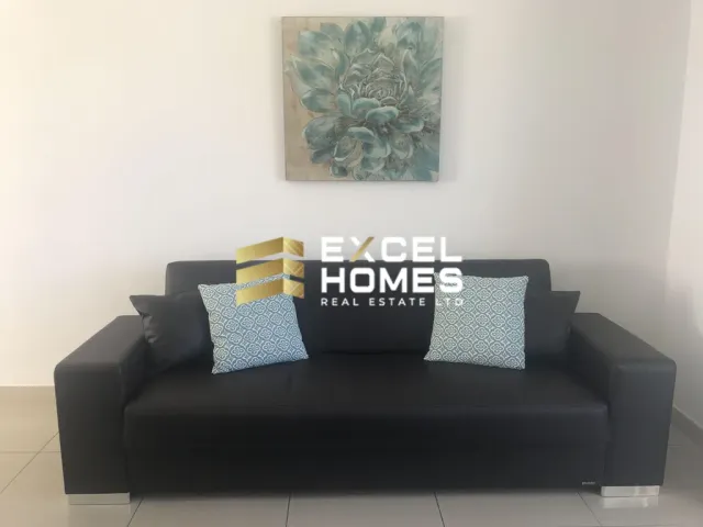 a couch with a book on it