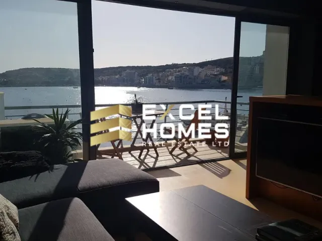 a view from a balcony of a boat and a balcony overlooking a city 