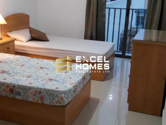 a bed room with a bed and a desk