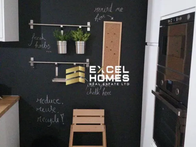 a kitchen with a sign that says "no eating"