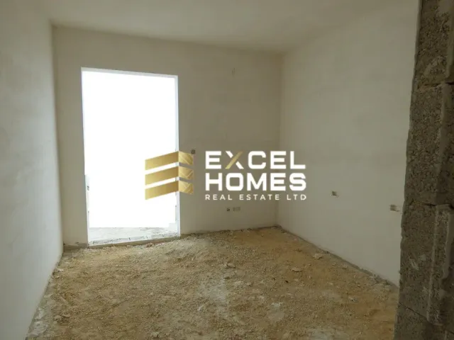 a wall with a door and a window