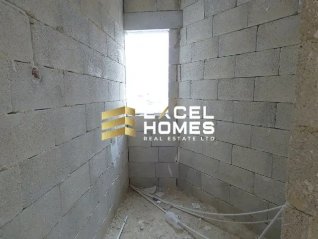 a wall with a broken down window and a wall with a brick wall