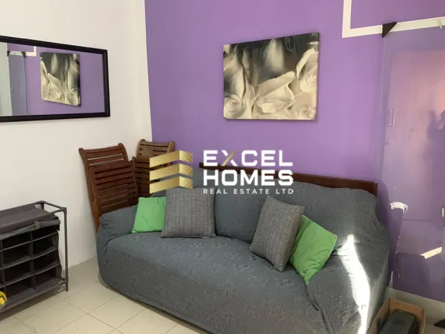 a couch with a picture of a cat on it