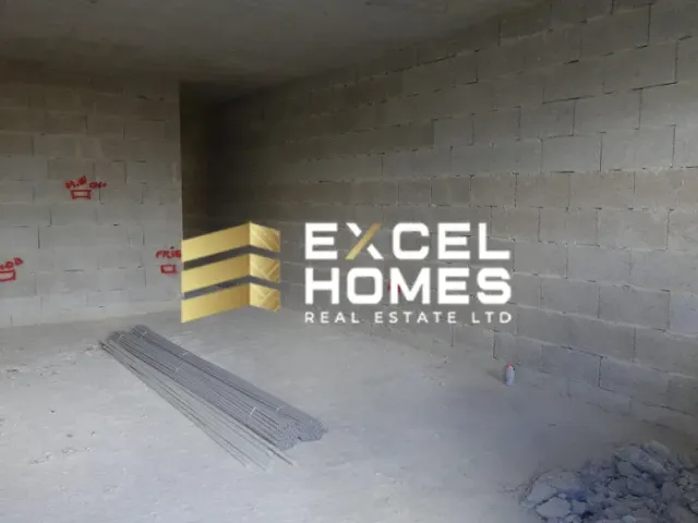 a wall with a graffiti covered wall and a skateboard