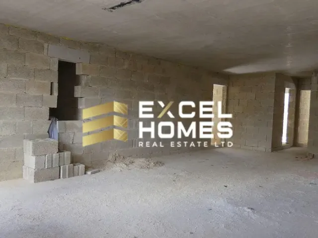 a wall with a wall of bricks and a clock