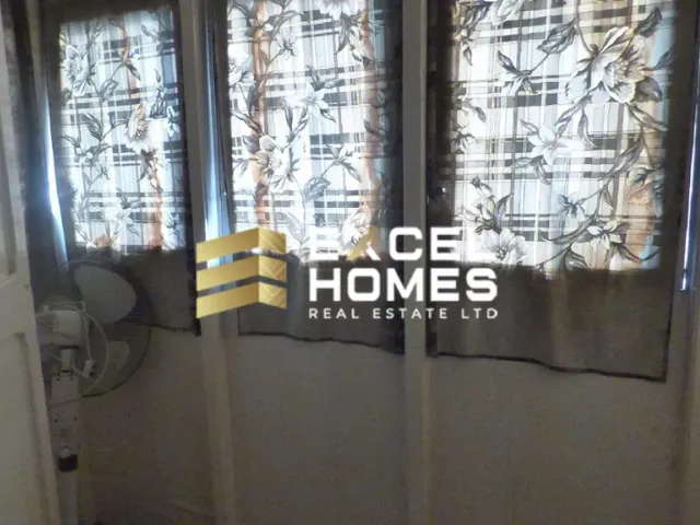 a mirror with a picture of a man in it