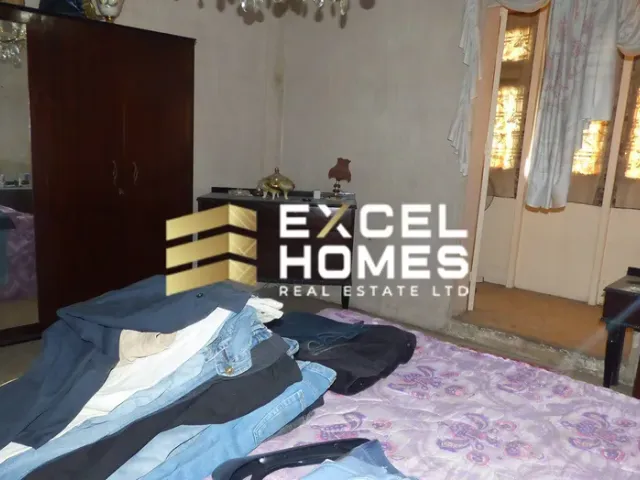 a bed with a bedspread and a bedspread cover