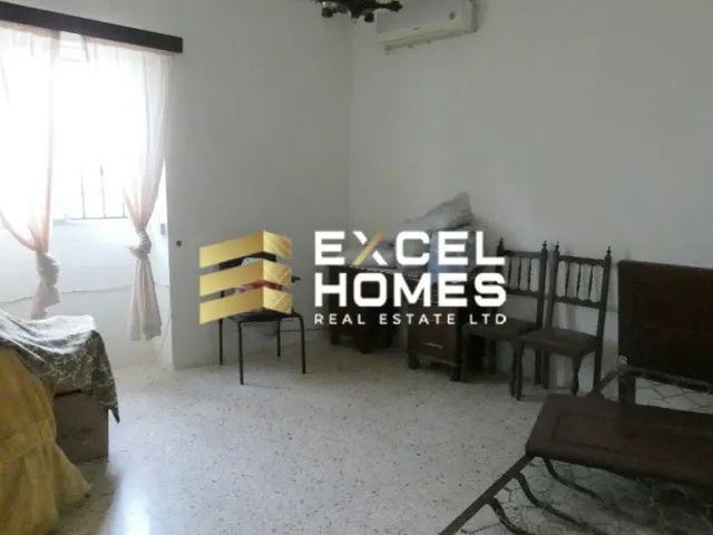 a living room with a couch and a table