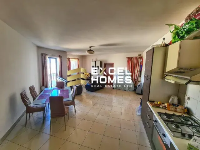 a kitchen with a table and a sink