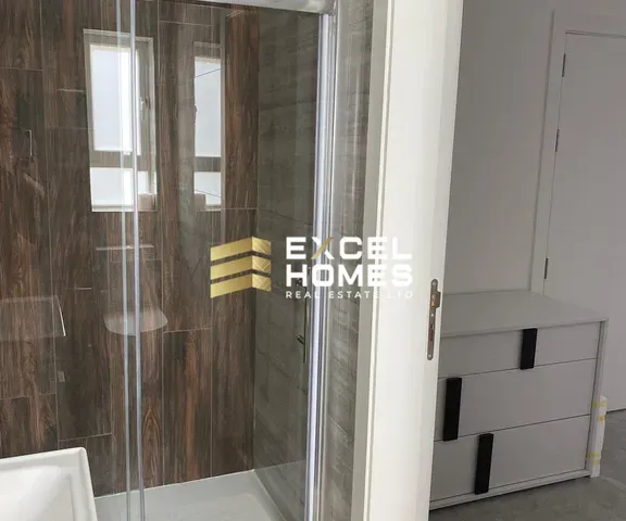 a glass door with a shower curtain