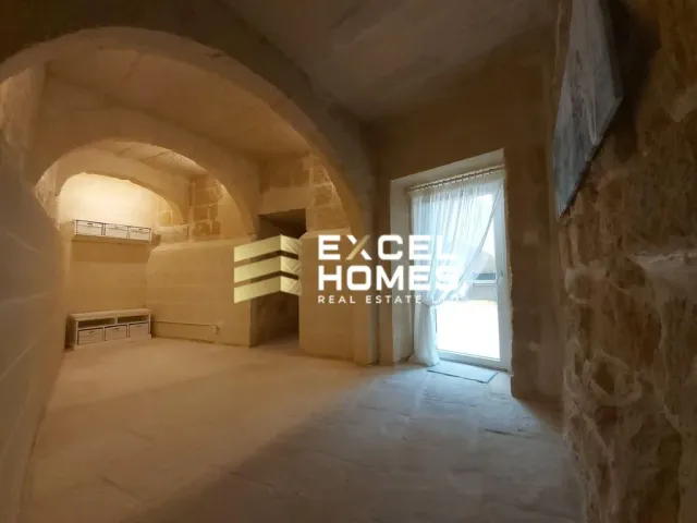 a room with a door and a window