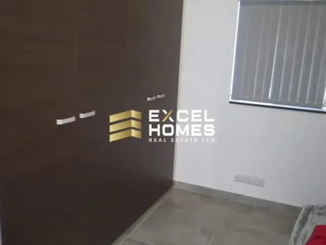 a white wall with a black and white photo