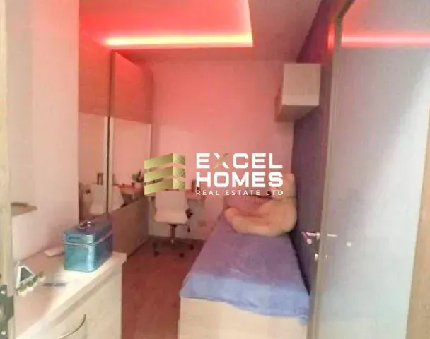 a woman is drying her hair in a bathroom