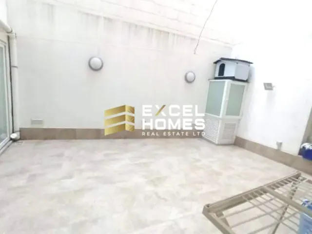 a bathroom with a toilet and a shower stall