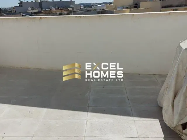 a yellow and black airplane with a picture of a man on it