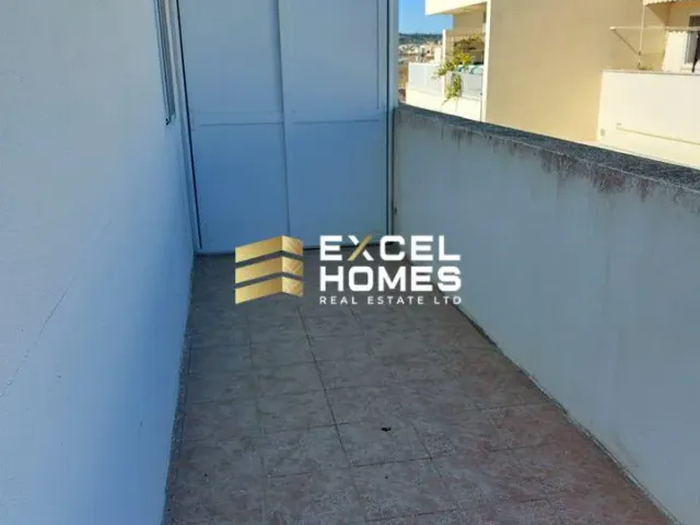 a blue wall with a blue door and a white wall