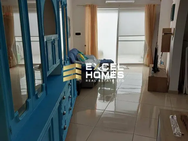 a room with a blue floor and a blue wall