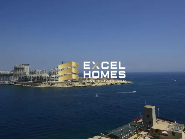 a large building with a large ocean view 