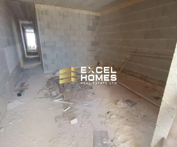 a broken down building with a broken down wall