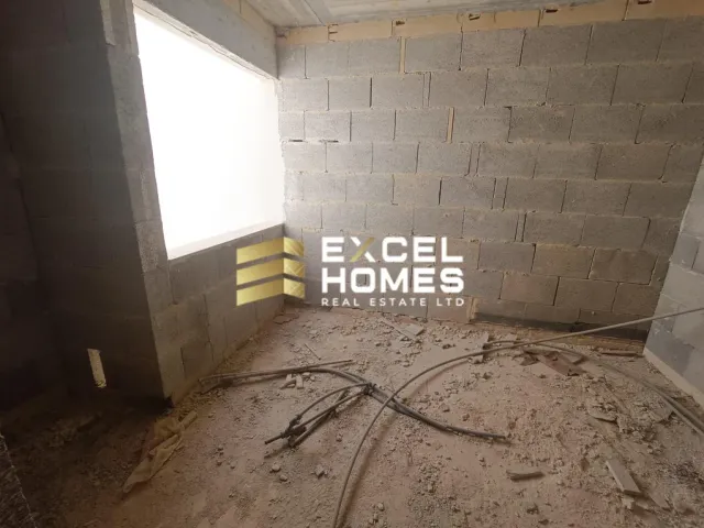 a broken down building with a broken wall