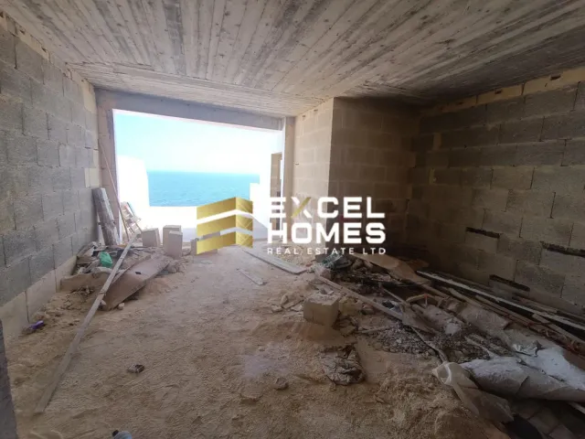 a building with a ladder and a wall