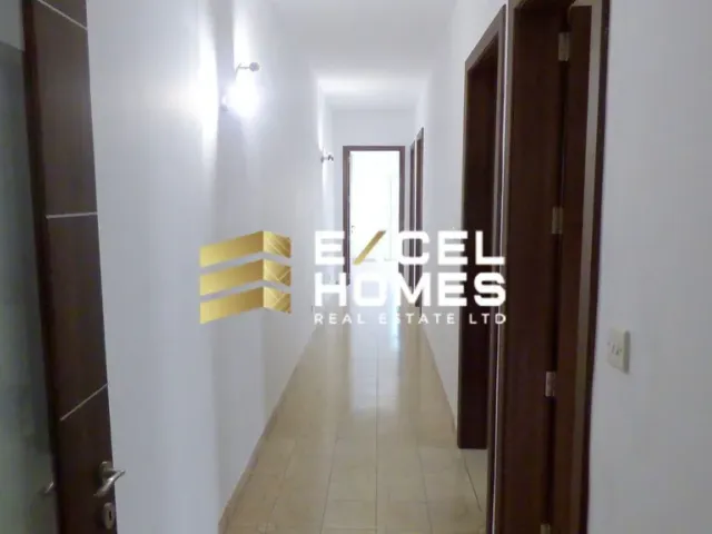 a hallway with a door leading to a hallway with a door leading to a hallway with a door leading to a hallway with a door leading to a hallway with a door leading to a hallway with a door leading to a hallway with a door leading to a