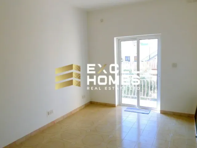 a door leading to a room with a door open 