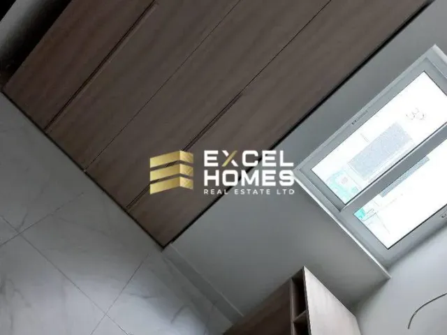 a white wall with a black and white striped wall